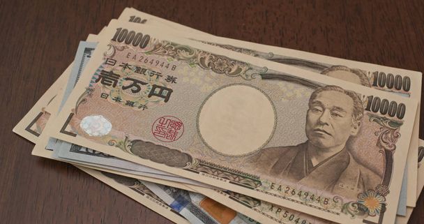 Pile de USD et yen japonais
  - Photo, image