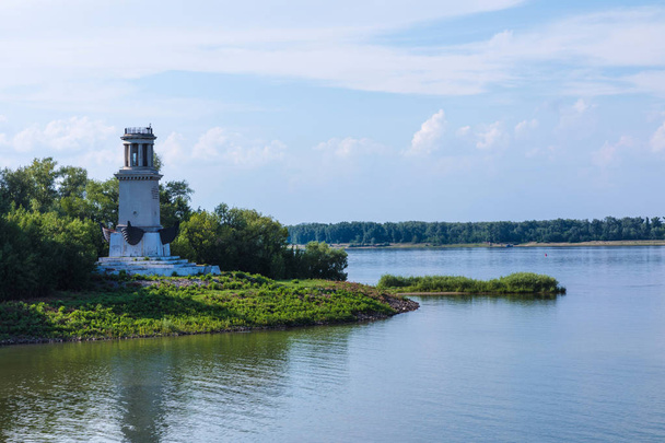 The old lighthouse or beacon near the first sluice on the Volga-Don Channel in Volgograd city in the hot sunny summer day - Fotografie, Obrázek