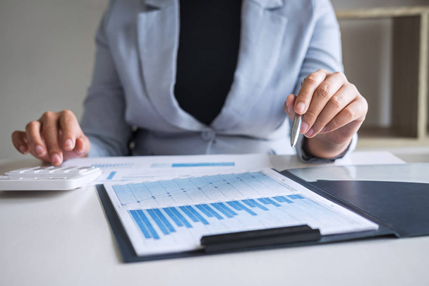 Business woman accountant working audit and calculating expense  - Photo, Image