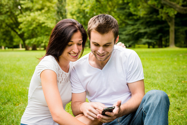Young couple with smartphone - Foto, immagini