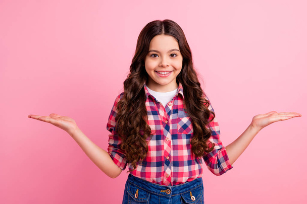 Portrait of nice sweet positive cheerful enjoy young promoter measurement length choice decision advertisement recommend demonstrated wear plaid clothes isolated pastel background - Photo, Image