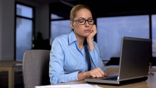 Exhausted woman with closed eyes resting in office, lack of sleep busy lifestyle - Photo, Image