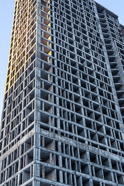 высокое строительство дома цемента инженерного фона вертикальное фото
 - Фото, изображение