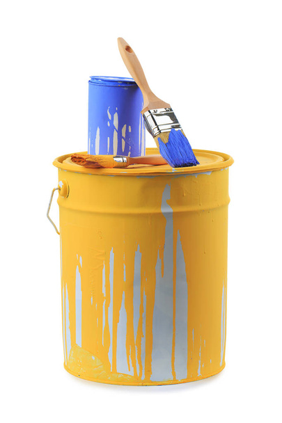 Open cans of paint in different colors and brushes. - Photo, Image