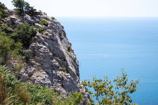 Black Sea view from the mountain. Light sunny summer day, Crimea, - 写真・画像