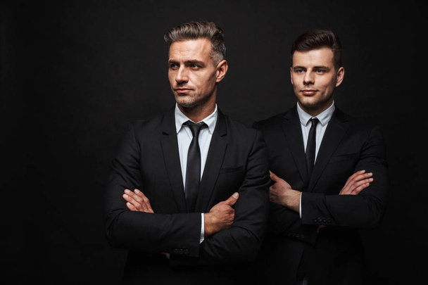 Two confident handsome businessmen wearing suit - Valokuva, kuva