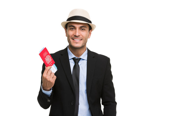 Caucasian businessman holding passport - Photo, image