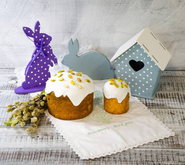 Easter decoration set with glazed kulich and vanilla eclairs - Photo, image