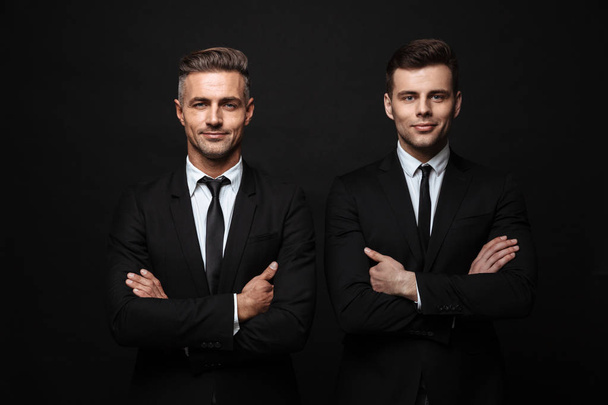 Two confident handsome businessmen wearing suit - Fotografie, Obrázek