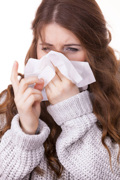 Sick freezing woman sneezing in tissue - Fotografie, Obrázek