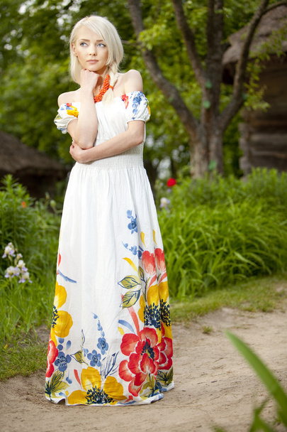 Young rural woman at the garden - Fotó, kép