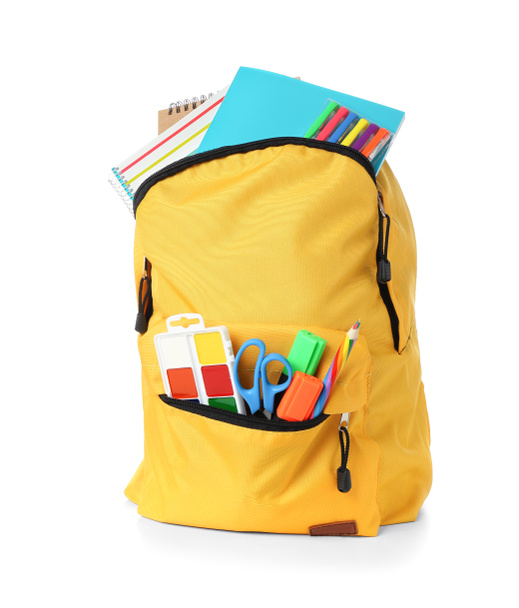School backpack with stationery on white background - Фото, зображення