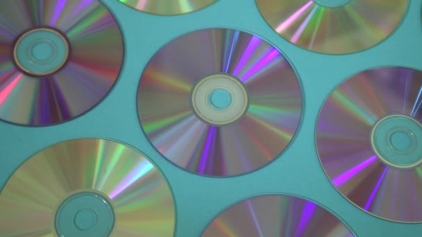ヴィンテージCdまたはDVDディスクの背景、データストレージに使用される古いサークルディスク、映画や音楽を共有 - 映像、動画