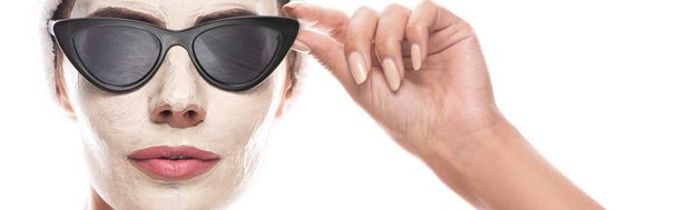 panoramic shot of woman with facial mask wearing sunglasses isolated on white - Fotó, kép