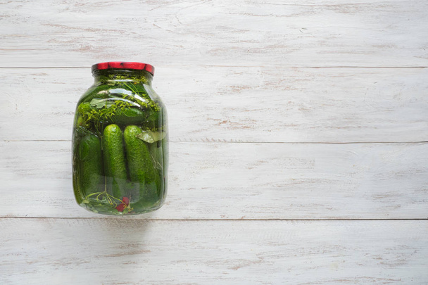 Canning cucumbers. Jar of pickles for the winter - Photo, Image