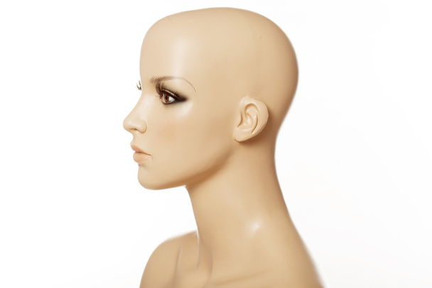 Голова жіночого манекена в профілі ізольовано на білому
 - Фото, зображення