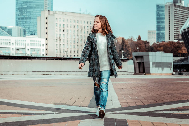 Pretty teenager enjoying her active weekend in city - Valokuva, kuva
