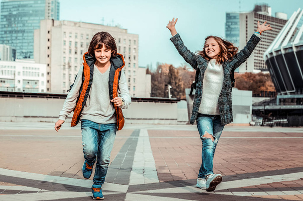 Cheerful kids having active weekends in the big city - Fotografie, Obrázek