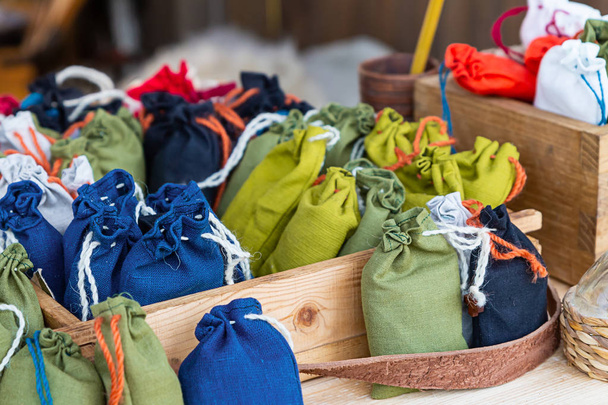 many eco bags natural cotton medicinal herbs background basic rustic medical - 写真・画像