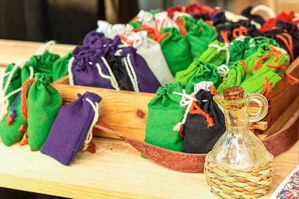 herb bag set of aromatic sachets green, lilac and black aromatherapy oil decanter traditional medicine - Photo, Image