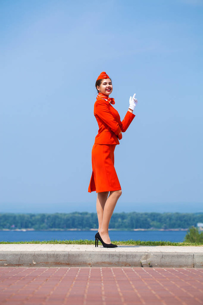 RUSSIA, SAMARA: 26 JULE 2019. Beautiful stewardess dressed in of - Fotó, kép
