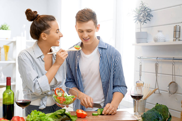 loving couple is preparing the proper meal - Фото, изображение