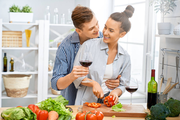 loving couple is preparing the proper meal - Фото, изображение