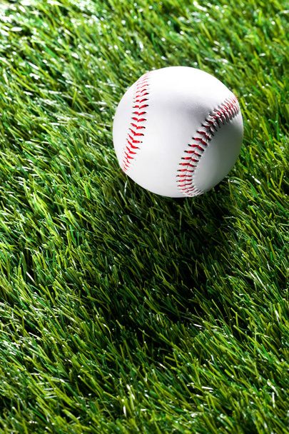 a baseball on the grass - Фото, зображення