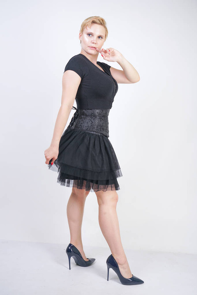 Portrait of beautiful girl in black corset goth dress - Foto, immagini