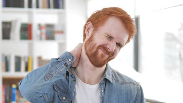 Young Casual Redhead Man with Neck Pain - Φωτογραφία, εικόνα