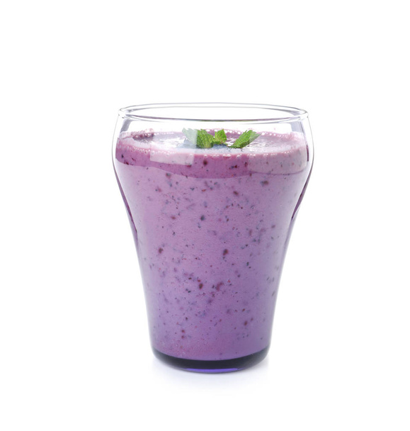 Glass of tasty blueberry smoothie with mint on white background - Foto, Imagem