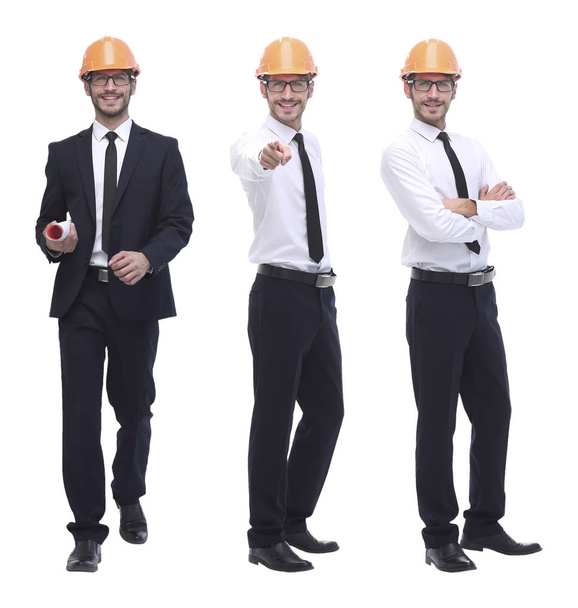 in full growth .successful architect engineer in orange helmet. - Valokuva, kuva