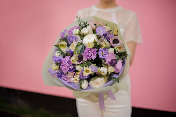 Close-up of bouquet with various purple flowers - Foto, afbeelding