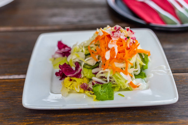 delicious  salad as an appetizer - Фото, изображение