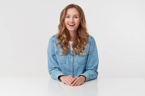Portrait of young happy cute curly blonde lady in denim shirts s - Foto, Imagem