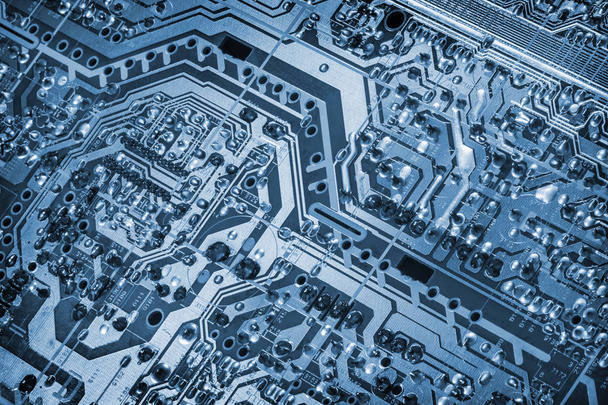 Bilgisayar elektronik mikrodevre anakart detay monokrom mavi vinyet arka plan - Fotoğraf, Görsel