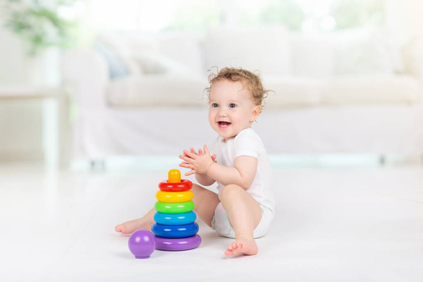 Baby playing with toys. Toy for child. Kids play. - Photo, Image
