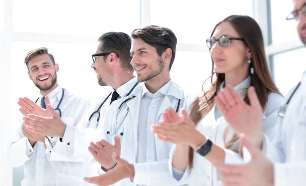 group of successful doctors applauds - Φωτογραφία, εικόνα