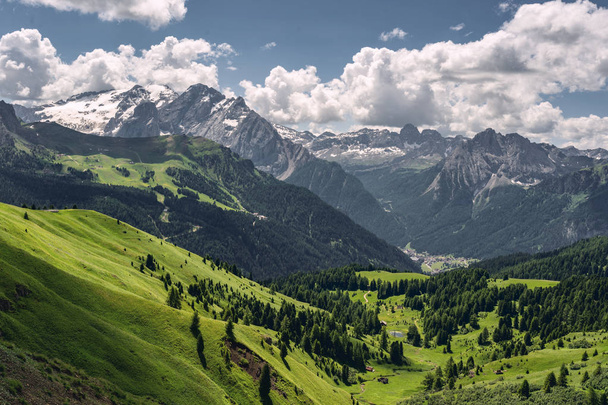Scenic Alps with green mountain under sky - Foto, afbeelding