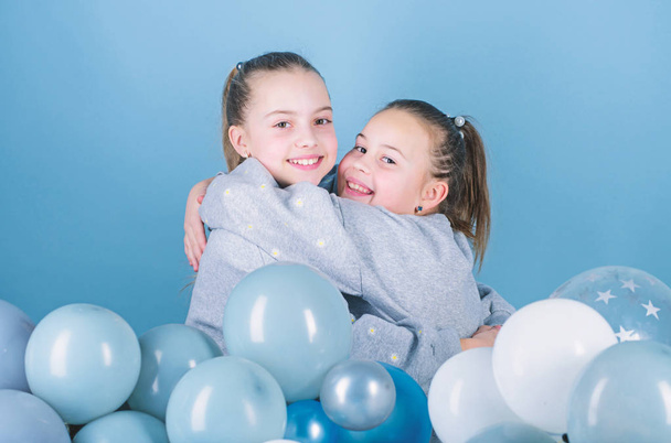 Birthday party. Happiness and cheerful moments. Carefree childhood. Start this party. Sisters organize home party. Having fun concept. Balloon theme party. Girls best friends near air balloons - Foto, imagen