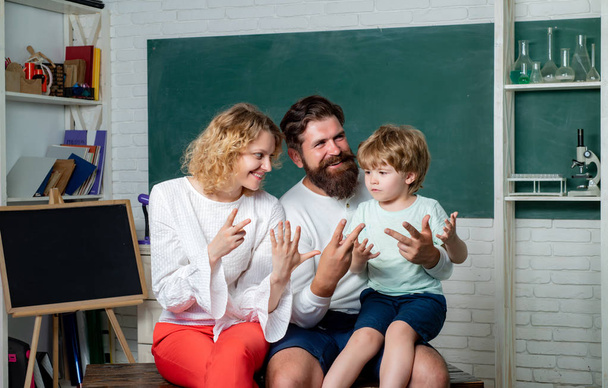 Cheerful family playing with set for creativity. Teachers day. School family. Home Family math schooling - Parents teaching kids private lessons in math. - Fotoğraf, Görsel