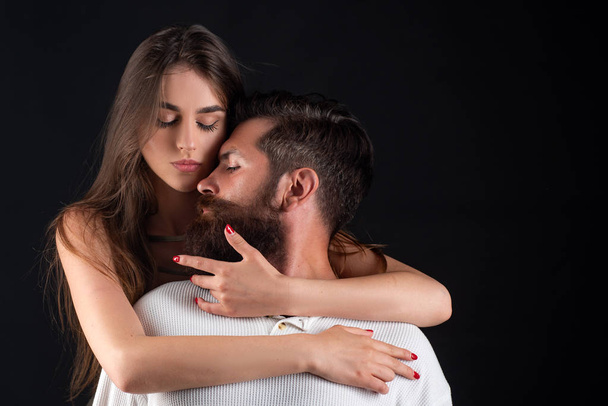 Young couple having passionate intense sex. Sensual kiss. Sensual relationship. Enjoying pleasure. Tenderness and intimacy. Retro vintage couple romancing. - Photo, image