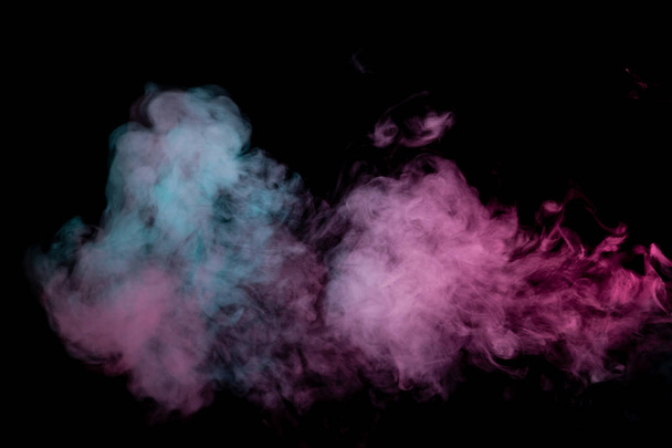Fond coloré avec des nuages de fumée sinueux à partir de motifs de
 - Photo, image