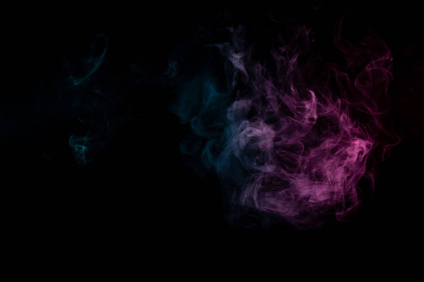 Цветной фон с извилистыми облаками дыма от узоров
 - Фото, изображение