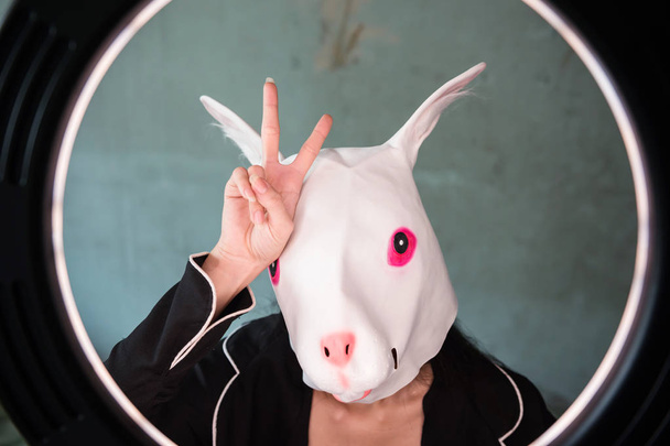 Girl with rabbit mask with v sign - Fotoğraf, Görsel