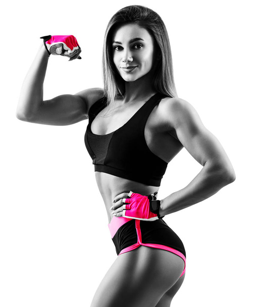 Mujer joven demostró su hermoso cuerpo atlético muscular
. - Foto, imagen
