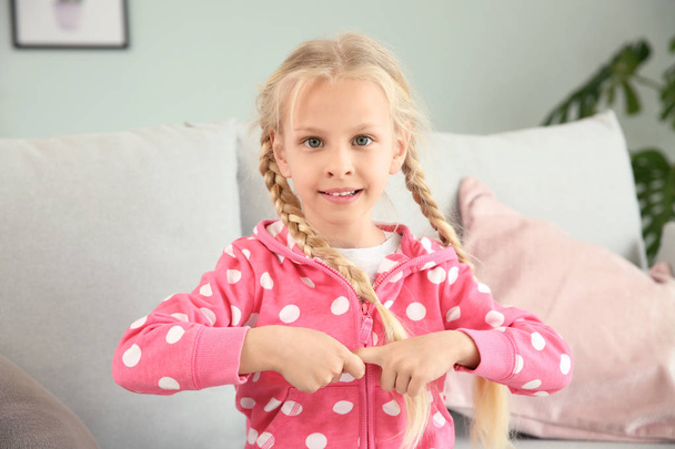 Little deaf mute girl using sign language at home - Photo, image