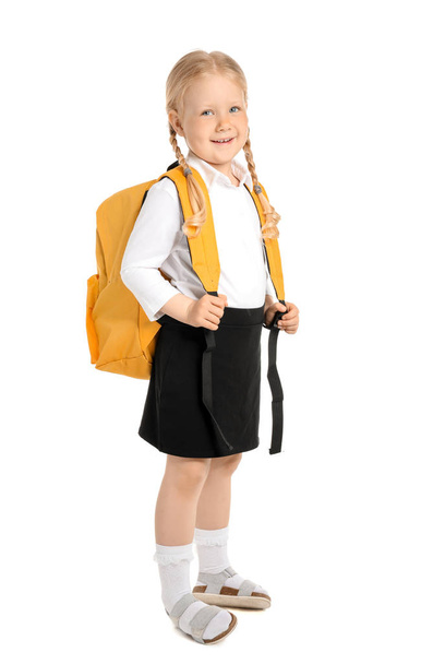 Portrait of adorable little schoolgirl on white background - Foto, Bild
