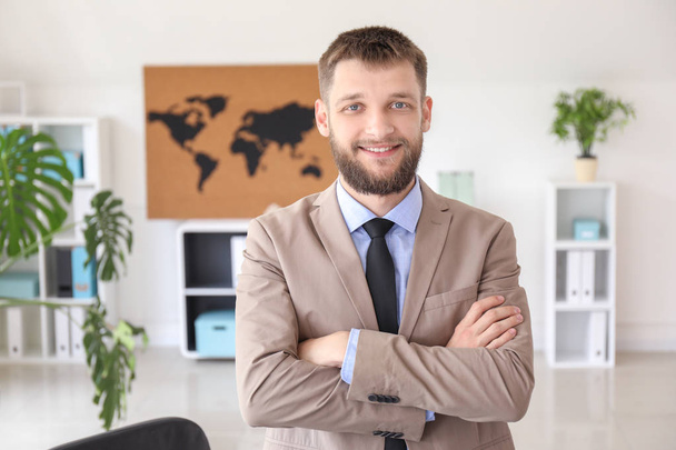 Male travel agent in office - Photo, Image