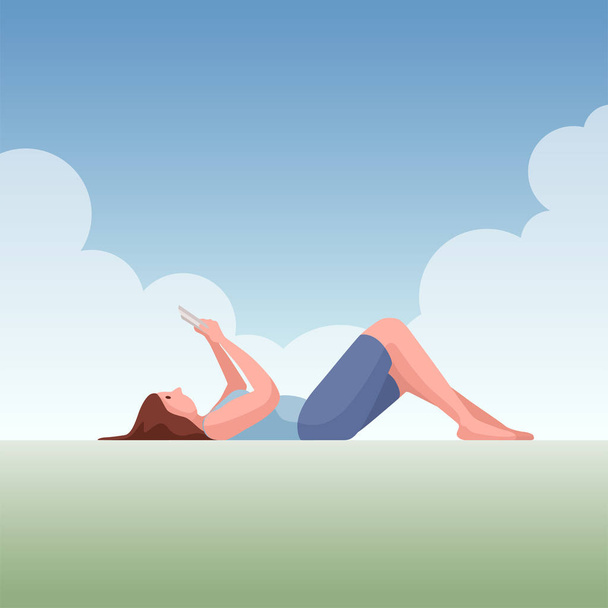 Young woman lying down under the sky and reading a book - Vector, Image
